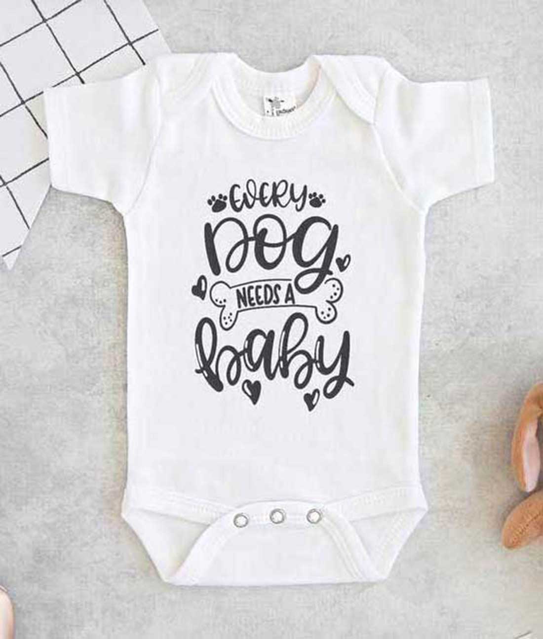 Every Dog Needs A Baby Baby Onesie - FEROLOS.COM