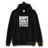 Hope shines brightest in the dark Hoodie
